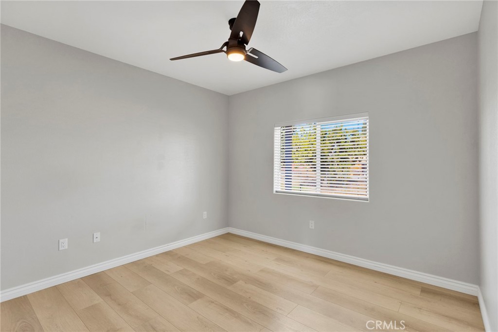 16150 Smoke Tree Street Hesperia, CA 92345 - Photo 26 of 32 a view of an empty room with a window