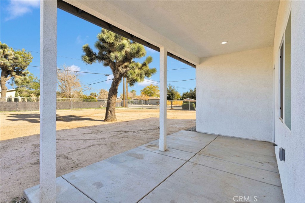 16150 Smoke Tree Street Hesperia, CA 92345 - Photo 27 of 32 a view of a hallway