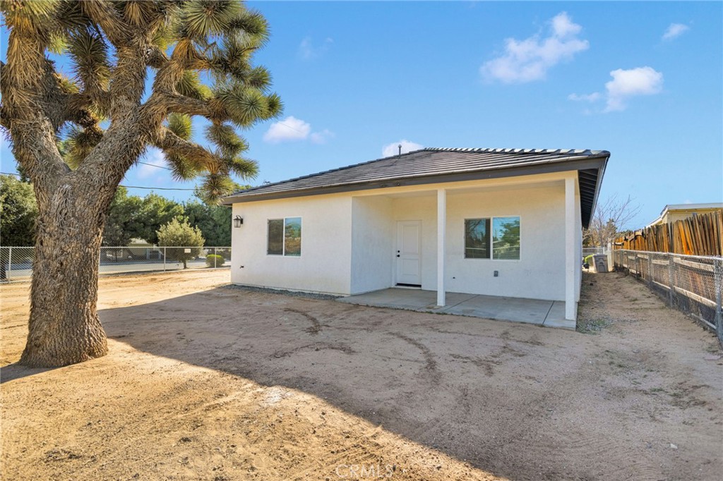 16150 Smoke Tree Street Hesperia, CA 92345 - Photo 29 of 32 a view of backyard of a house