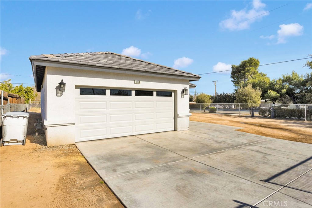 16150 Smoke Tree Street Hesperia, CA 92345 - Photo 6 of 32 a view of a backyard of the house