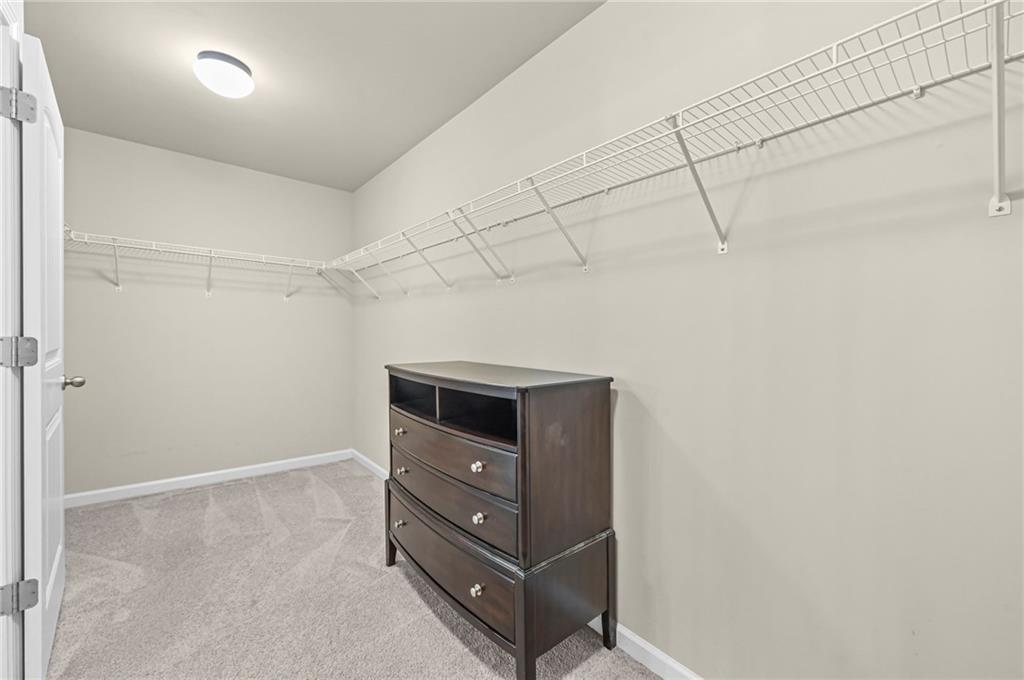 780 Springs Crest Drive Dallas, GA 30157 - Photo 25 of 47 a view of an empty walk in closet
