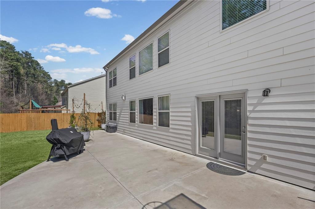 780 Springs Crest Drive Dallas, GA 30157 - Photo 40 of 47 a backyard of a house with seating space