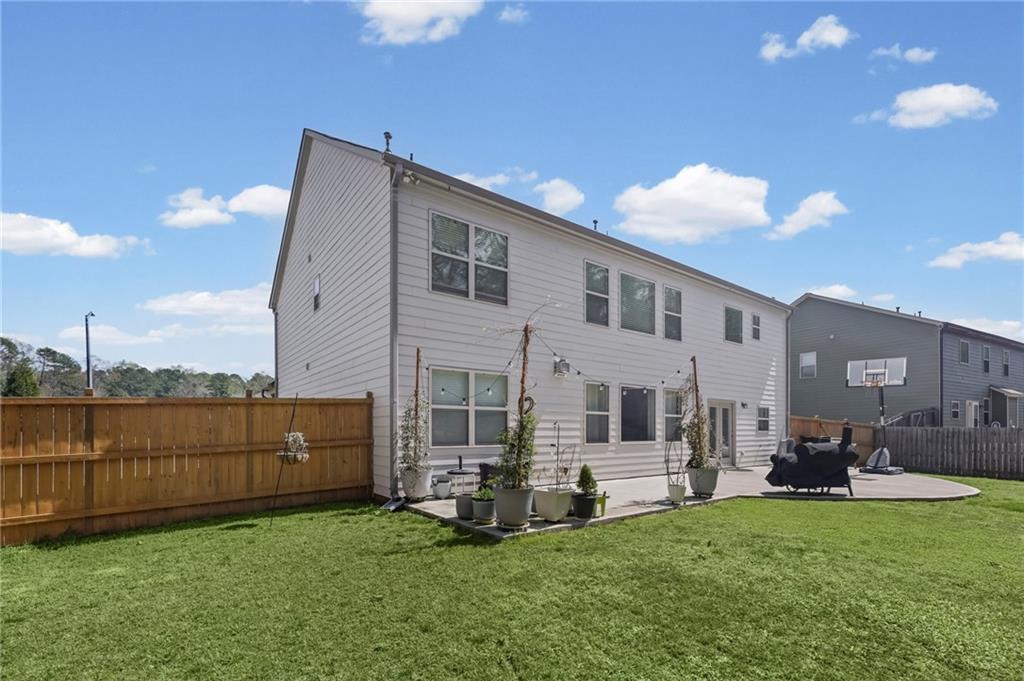 780 Springs Crest Drive Dallas, GA 30157 - Photo 42 of 47 a view of a house with backyard and sitting area
