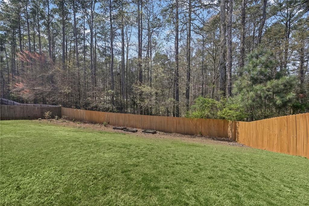 780 Springs Crest Drive Dallas, GA 30157 - Photo 44 of 47 a view of a backyard
