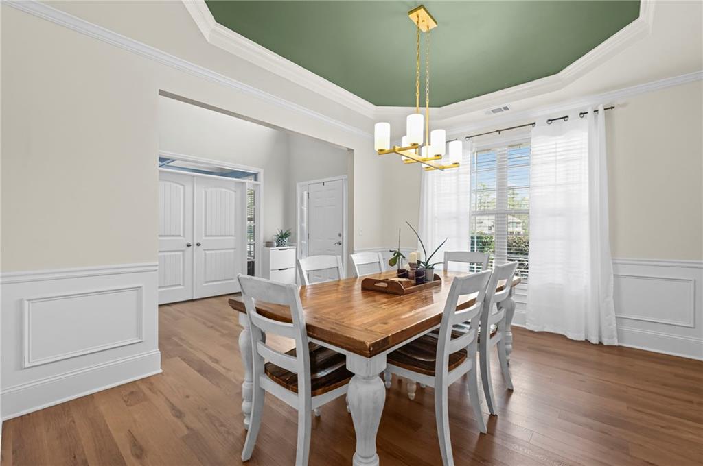 780 Springs Crest Drive Dallas, GA 30157 - Photo 5 of 47 a view of a dining room with furniture window and wooden floor