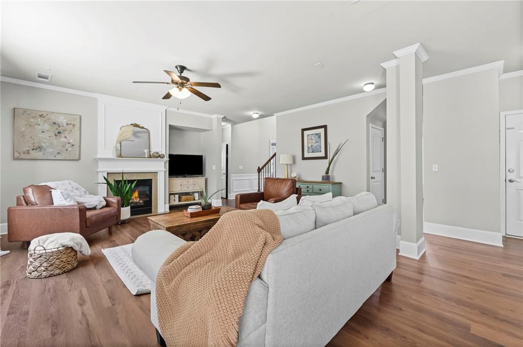 780 Springs Crest Drive Dallas, GA 30157 - Photo 10 of 47 a living room with furniture fireplace and flat screen tv