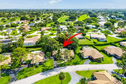 $535,000 | 433 Pine Villa Drive, Atlantis, FL 33462