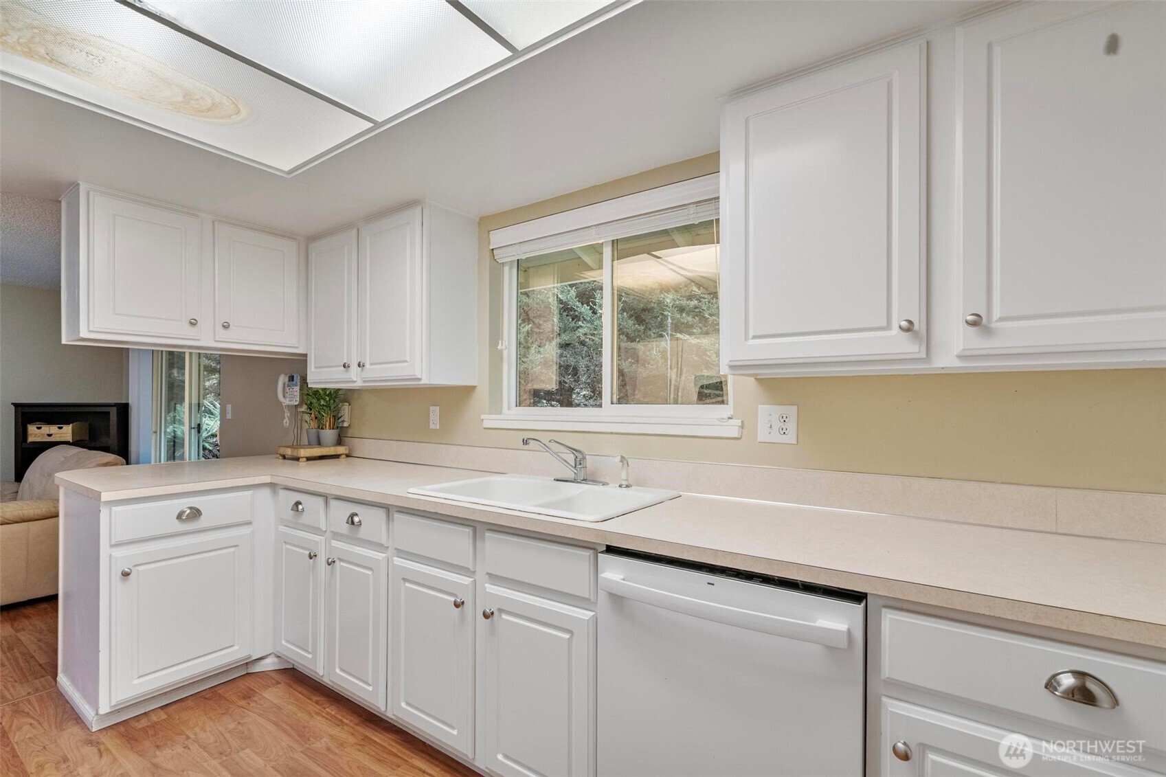 185 Brook Drive Chehalis, WA 98532 - Photo 11 of 40 a kitchen with white cabinets white appliances and a sink