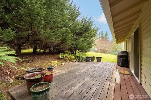 a view of a chairs and table on the wooden floor