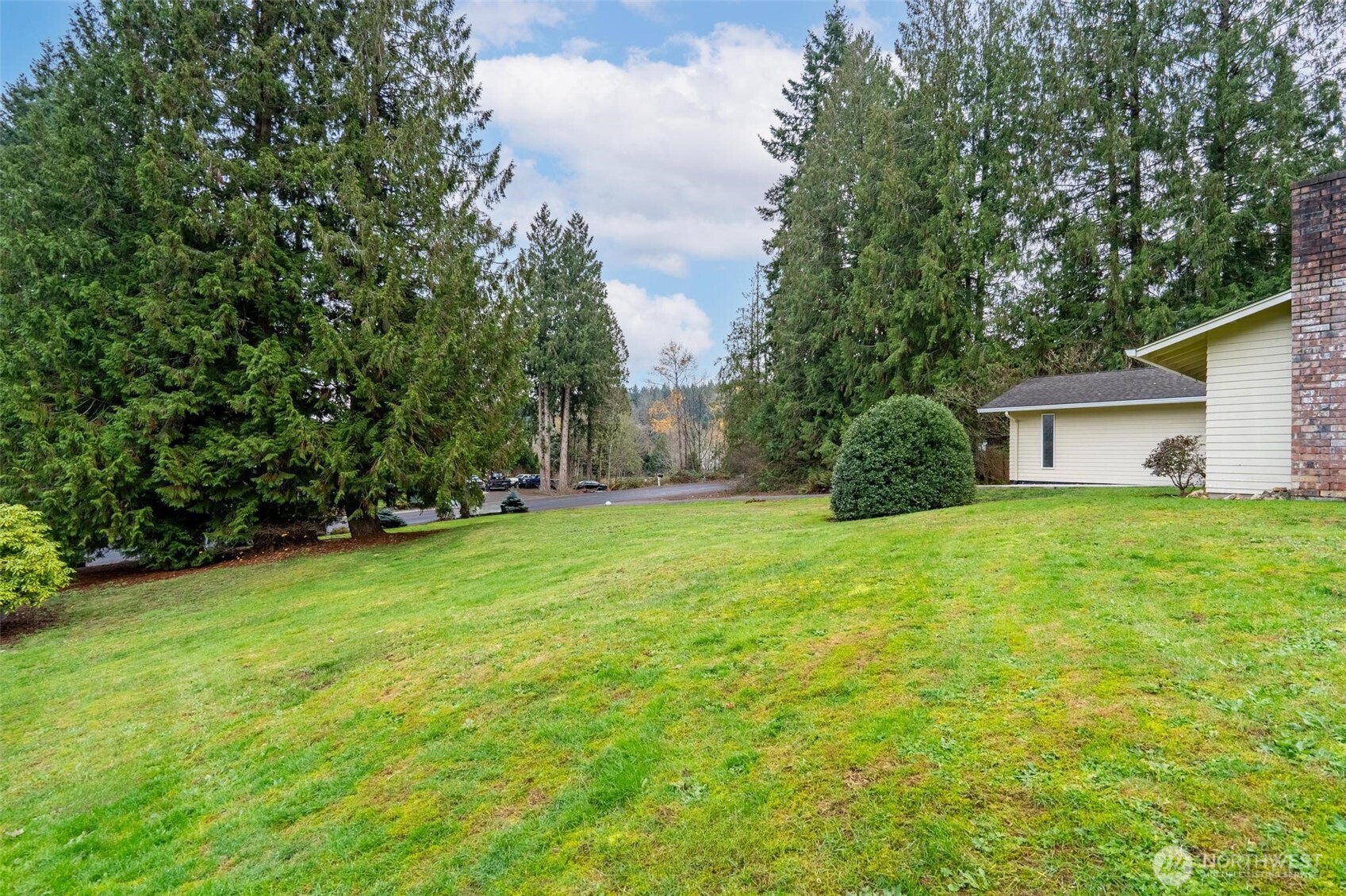 185 Brook Drive Chehalis, WA 98532 - Photo 35 of 40 a view of a house with backyard and garden