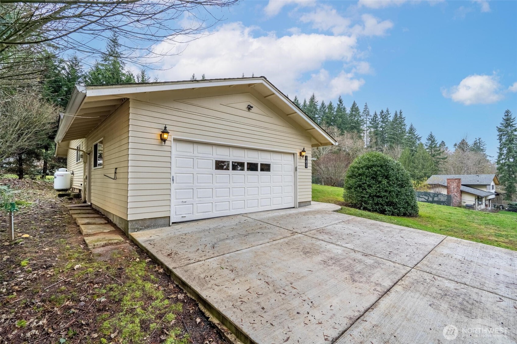 185 Brook Drive Chehalis, WA 98532 - Photo 36 of 40 a view of a house with a backyard