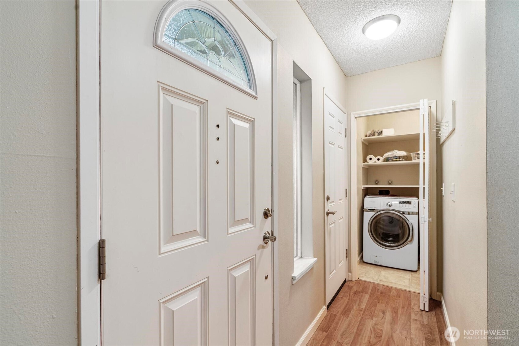 185 Brook Drive Chehalis, WA 98532 - Photo 37 of 40 a view of a hallway with washer and dryer