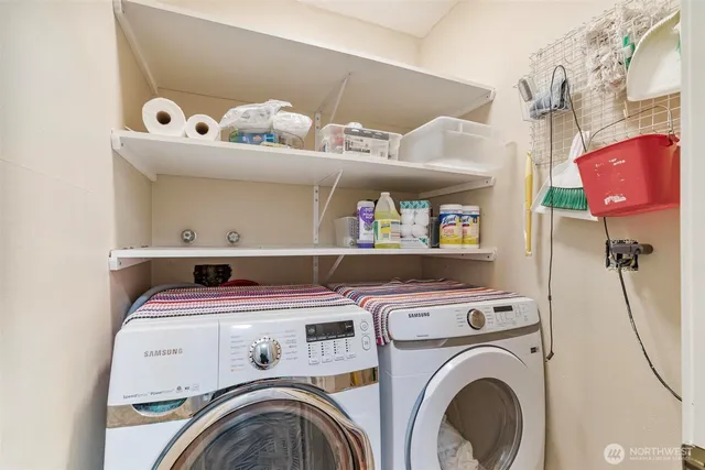 a utility room with dryer and washer