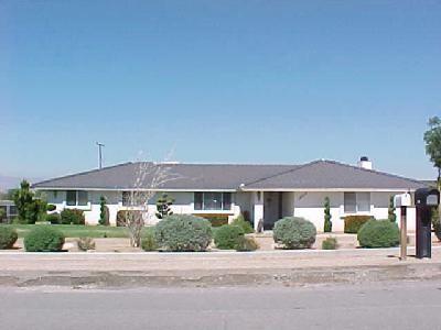 14612 Mandan Road Apple Valley, CA 92307 - Photo 1 of 1 front view of house with a yard