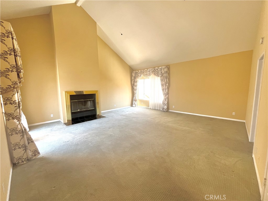 609 Fairview Avenue, Unit 2 Arcadia, CA 91007 - Photo 11 of 20 a view of an empty room with a fireplace