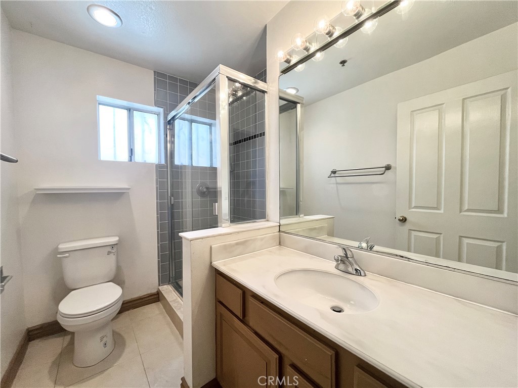 609 Fairview Avenue, Unit 2 Arcadia, CA 91007 - Photo 16 of 20 a bathroom with a toilet sink and mirror