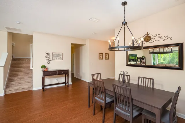 a living room with furniture fireplace and flat screen tv