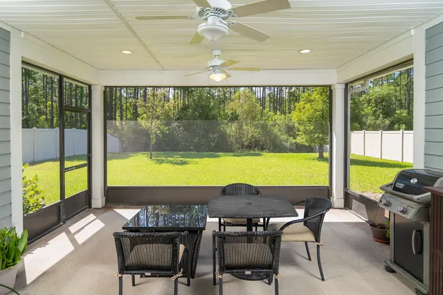 a view of a room with furniture and a potted plant