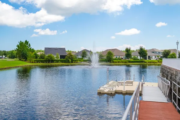a view of a park with swings and slides