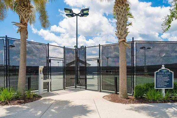 a view of yard with swimming pool and sitting area