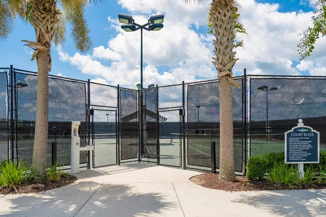 a view of yard with swimming pool and sitting area