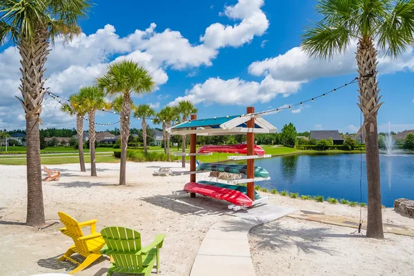 a bedroom with a bed and a table in it