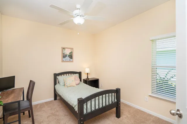 a view of kitchen filled with furniture and wooden floor