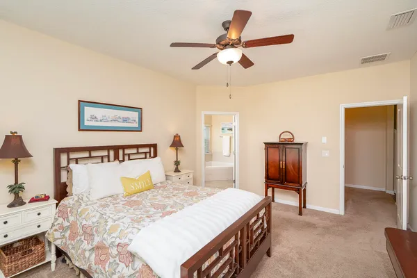 a bathroom with a bathtub shower sink and toilet