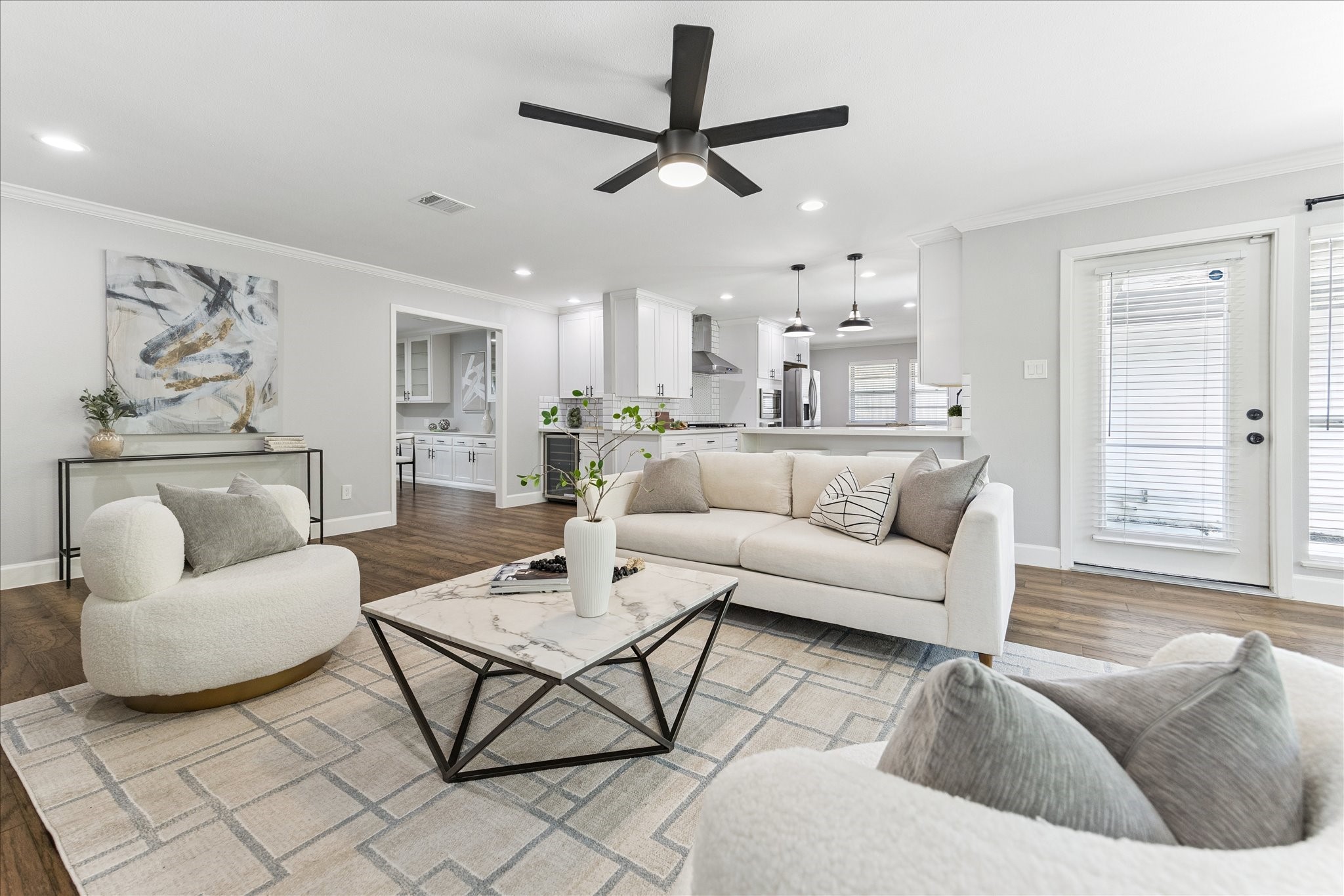 5414 Sanford Road Houston, TX 77096 - Photo 11 of 32 Indoor-outdoor living is easy with direct access from the living room and kitchen to the spacious rear yard.