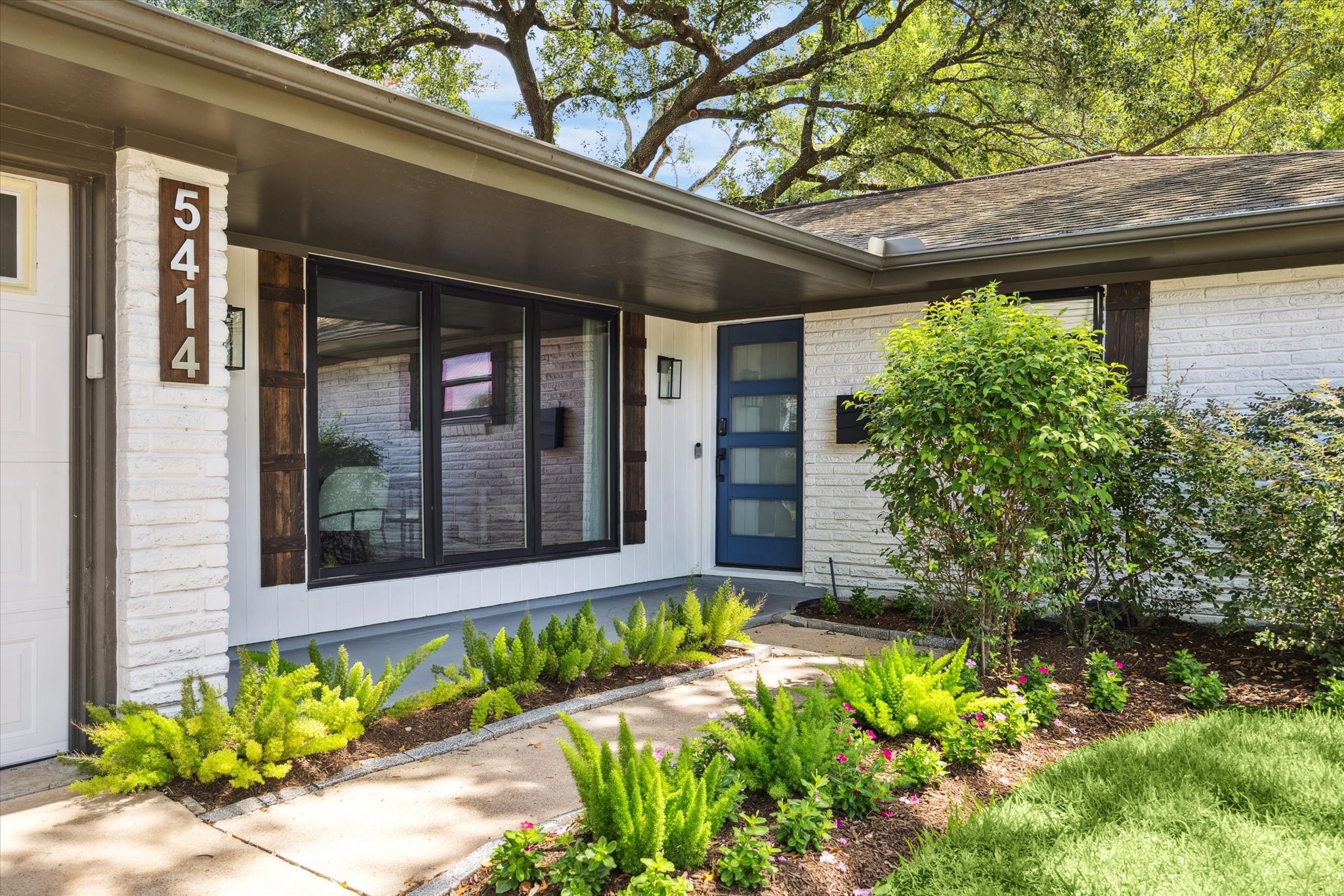 5414 Sanford Road Houston, TX 77096 - Photo 2 of 32 A handsome painted brick exterior, new shielded gutters and a windowed entry door welcome you home.