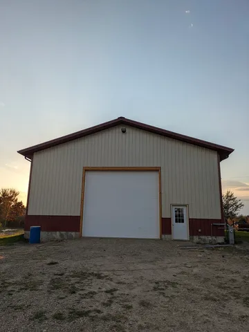 a lake view with a building in the background