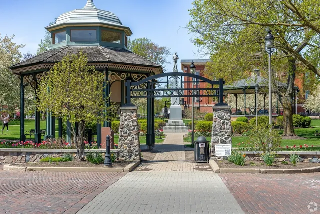 a view of a golf course with a lake