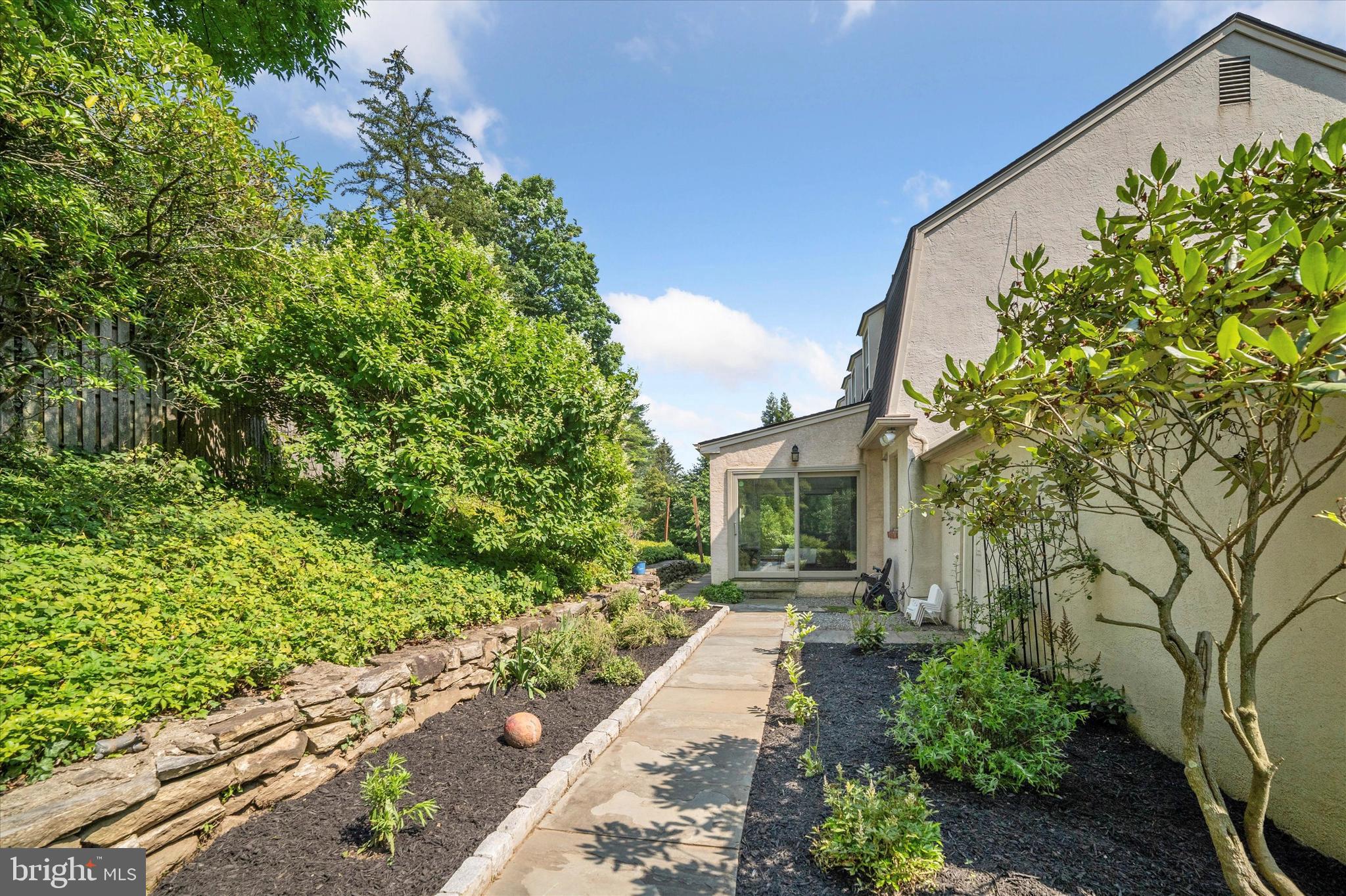 333 South Radnor Chester Road Villanova, PA 19085 - Photo 36 of 36 Walkway to sunroom