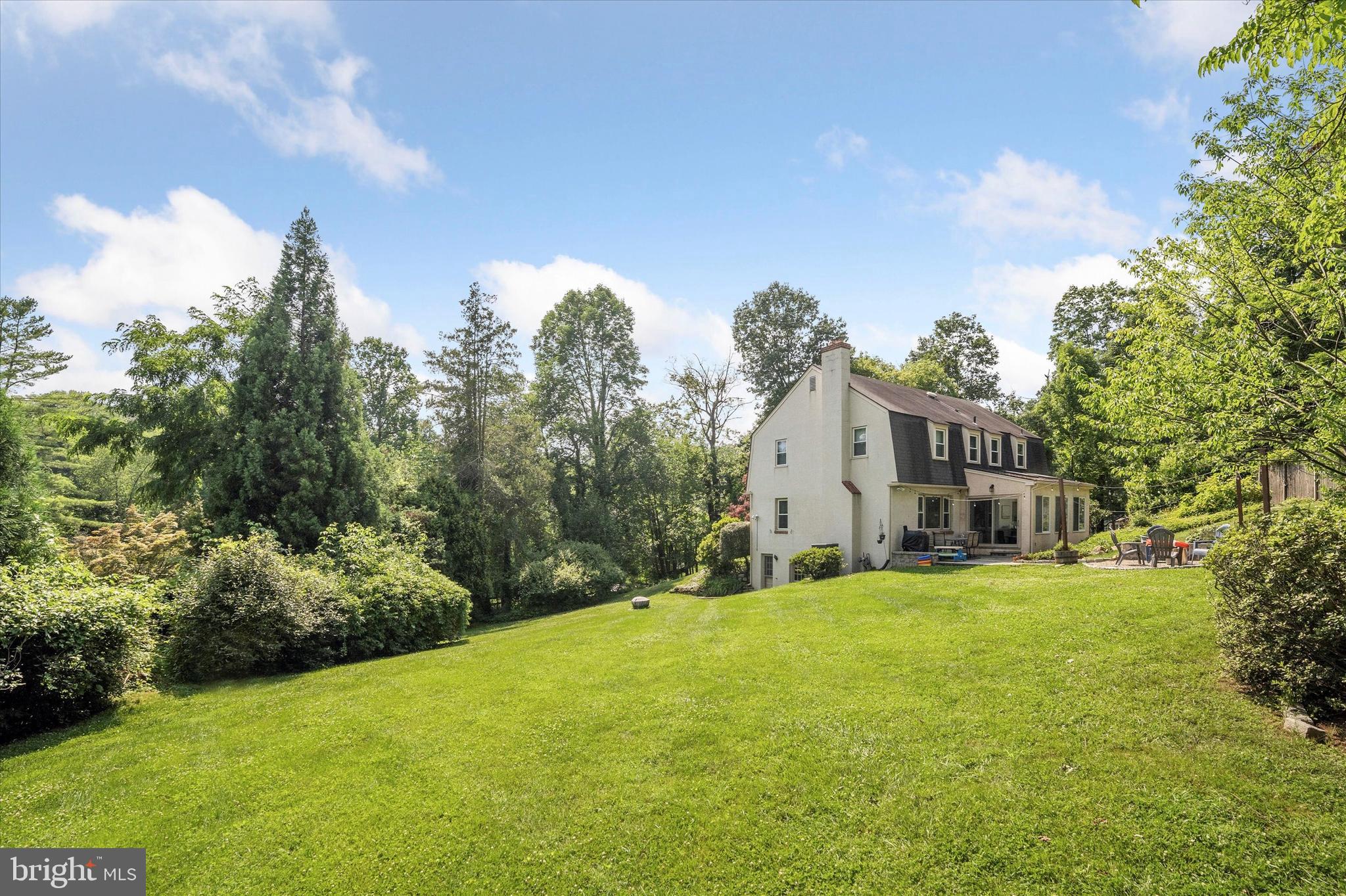 333 South Radnor Chester Road Villanova, PA 19085 - Photo 4 of 36 Side yard with view of fire pit
