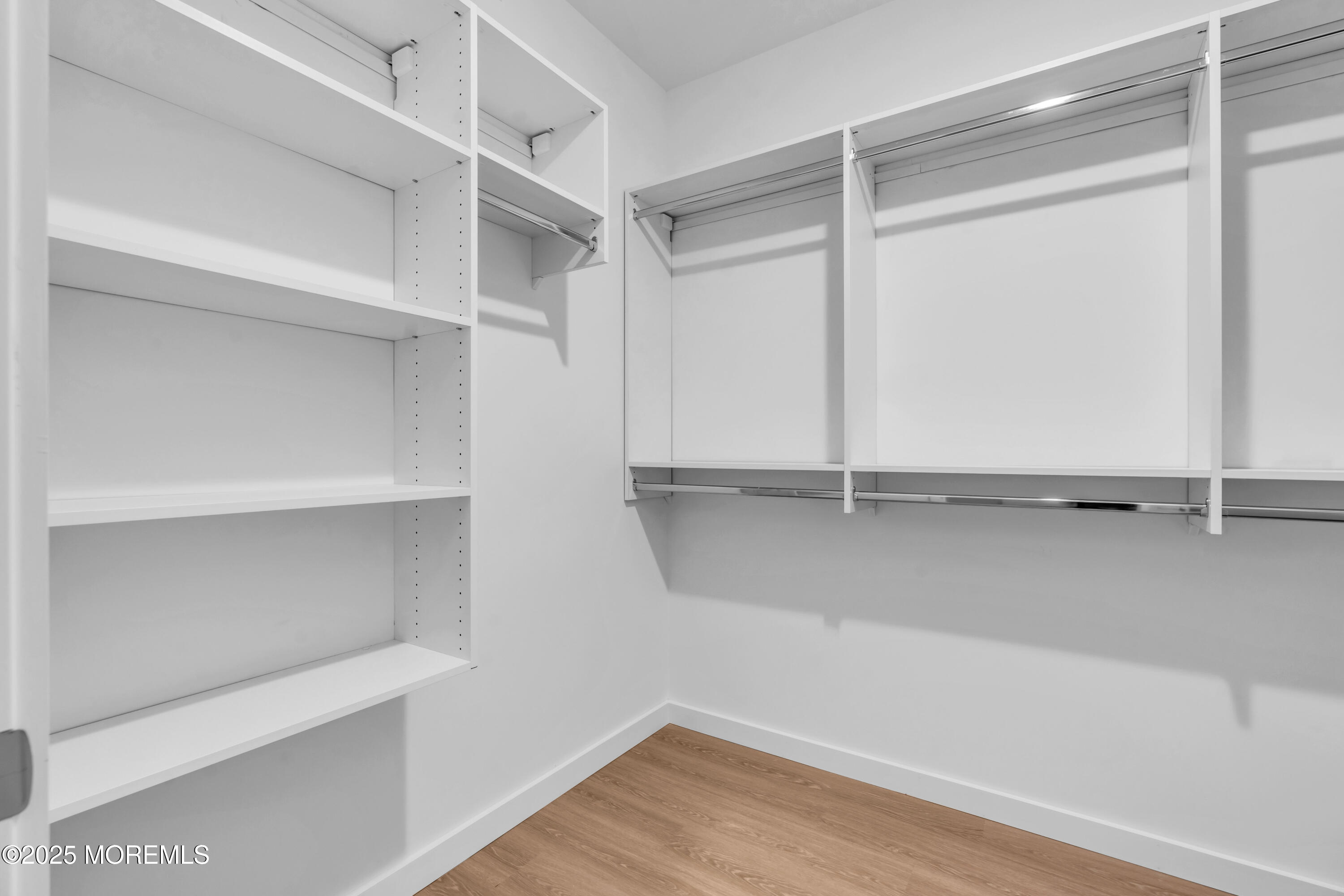 120 Monmouth Street, Unit 308 Red Bank, NJ 07701 - Photo 18 of 37 a view of an empty walk in closet