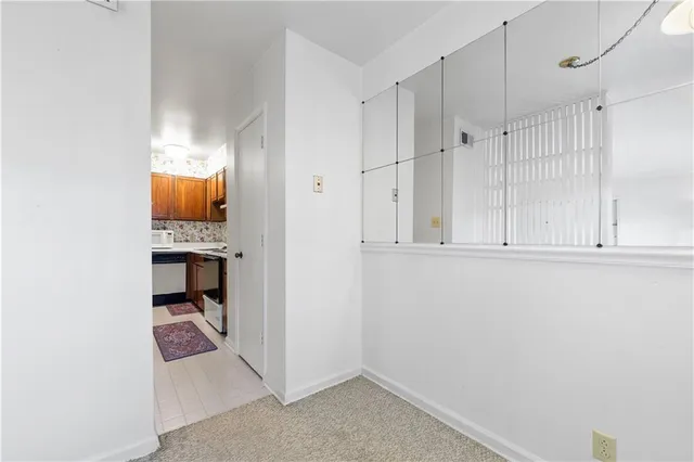 a kitchen that has a sink and a stove