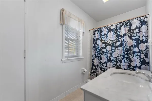 a view of a balcony with wooden floor