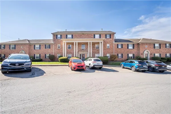 a living room with lots of furniture and a flat screen tv
