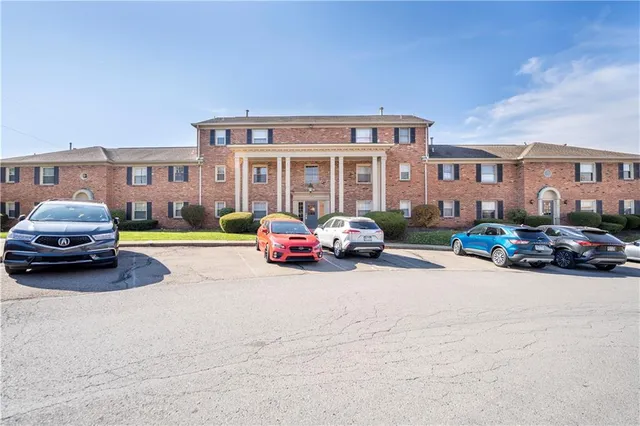 a living room with lots of furniture and a flat screen tv