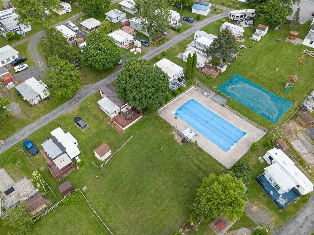 7945 Lake Road, Unit 44 AND 45 Sodus Point, NY 14555 - Photo 3 of 18 JUST STEPS TO THE INGROUND POOL!