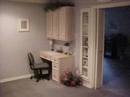a room with a table and chairs