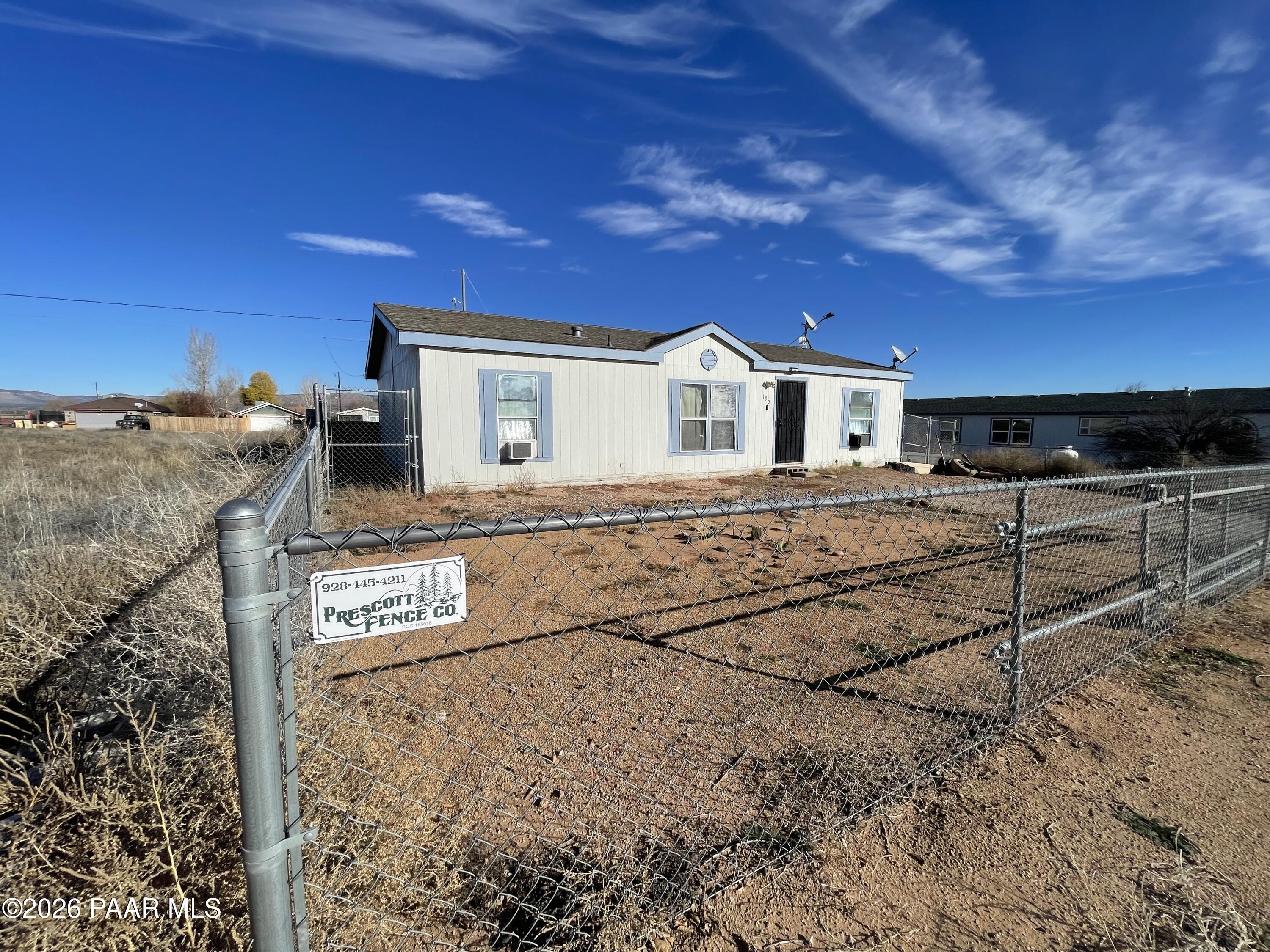 190 West Rio Trail Paulden, AZ 86334 - Photo 2 of 14 a view of a house with a yard and sitting area