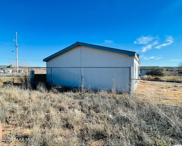 a house view with a backyard