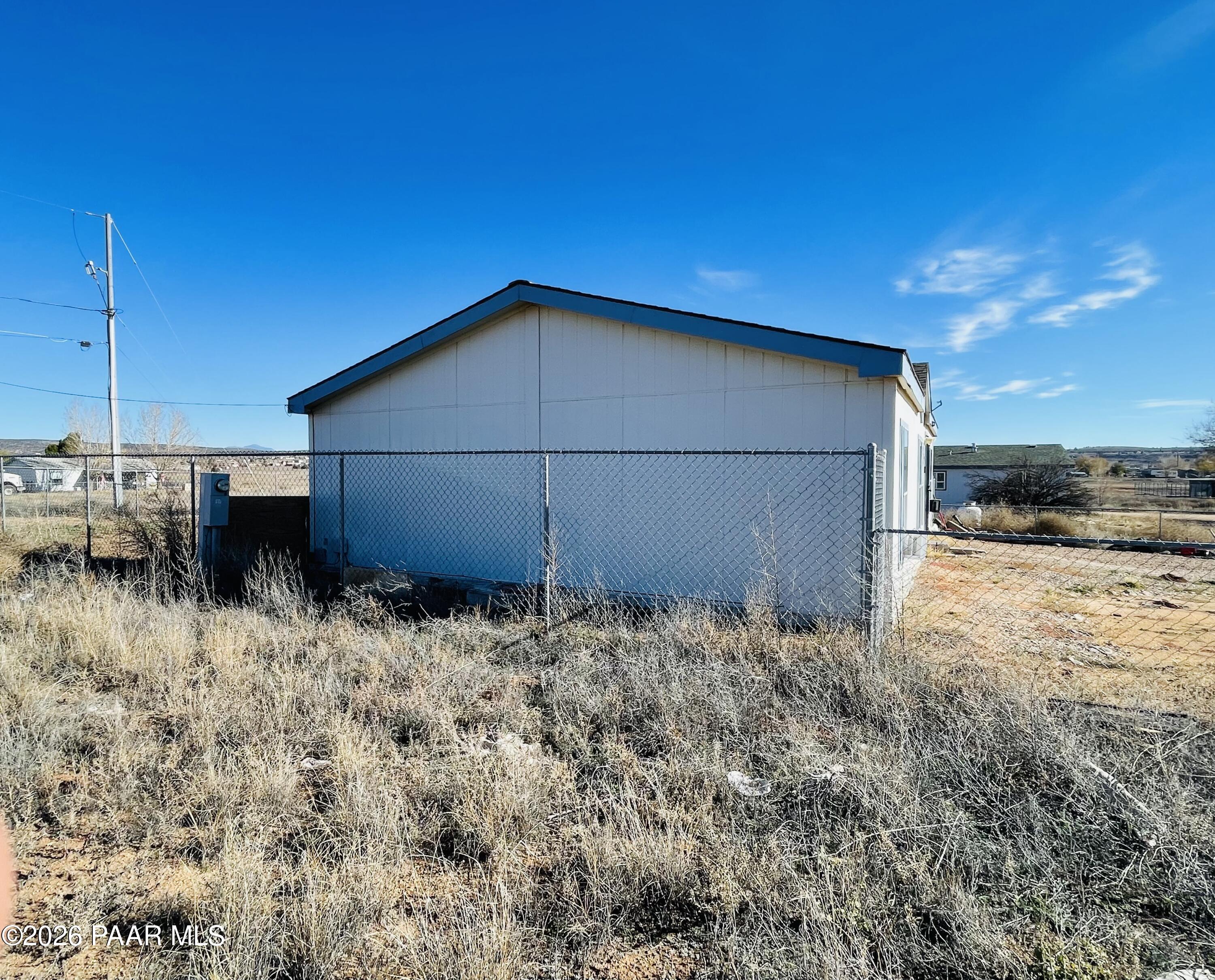 190 West Rio Trail Paulden, AZ 86334 - Photo 5 of 14 a house view with a backyard