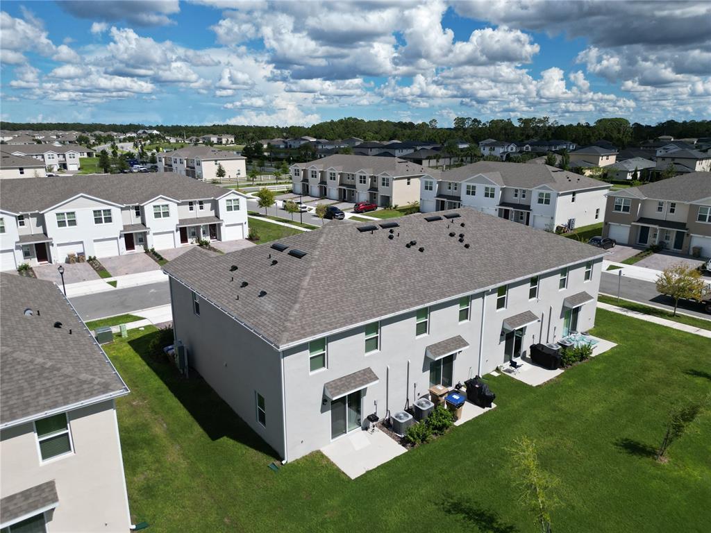 2914 Hudson Hammock Way St. Cloud, FL 34773 - Photo 6 of 30 a aerial view of a house with a yard