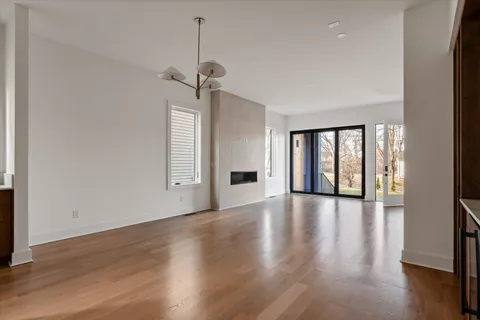 an entryway with wooden floor