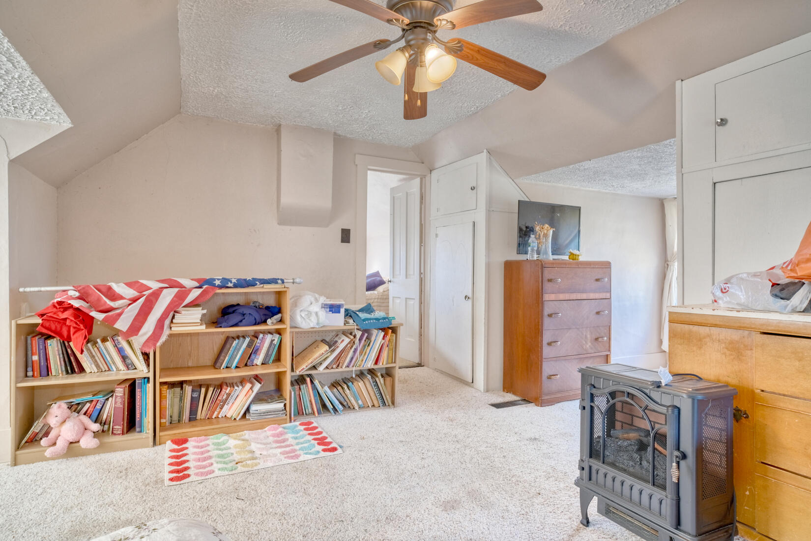 5790 West 700 South Morocco, IN 47963 - Photo 17 of 28 a bedroom with furniture and a book shelf