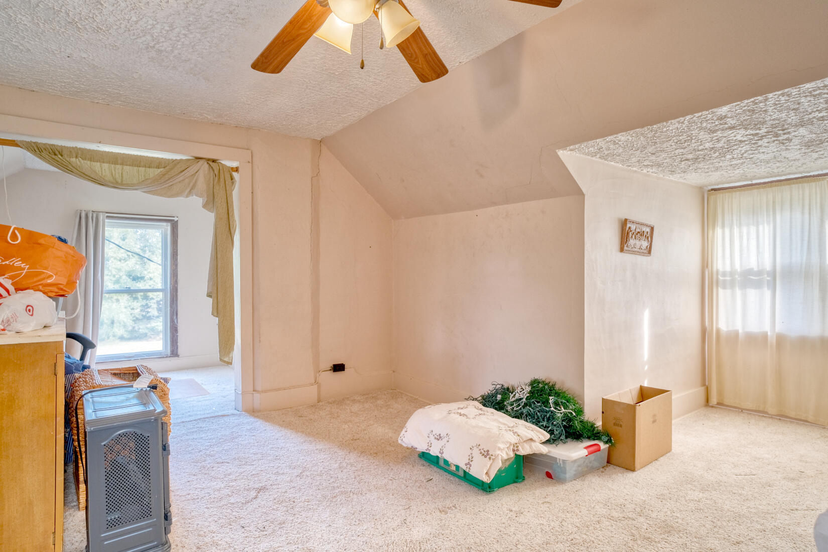 5790 West 700 South Morocco, IN 47963 - Photo 23 of 28 a bedroom with a bed and wooden floor