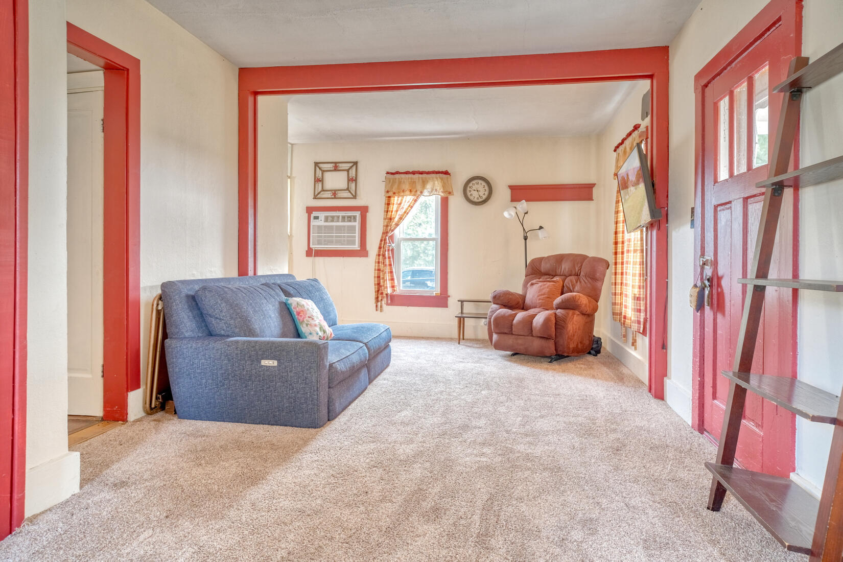 5790 West 700 South Morocco, IN 47963 - Photo 27 of 28 a living room with furniture and a large window