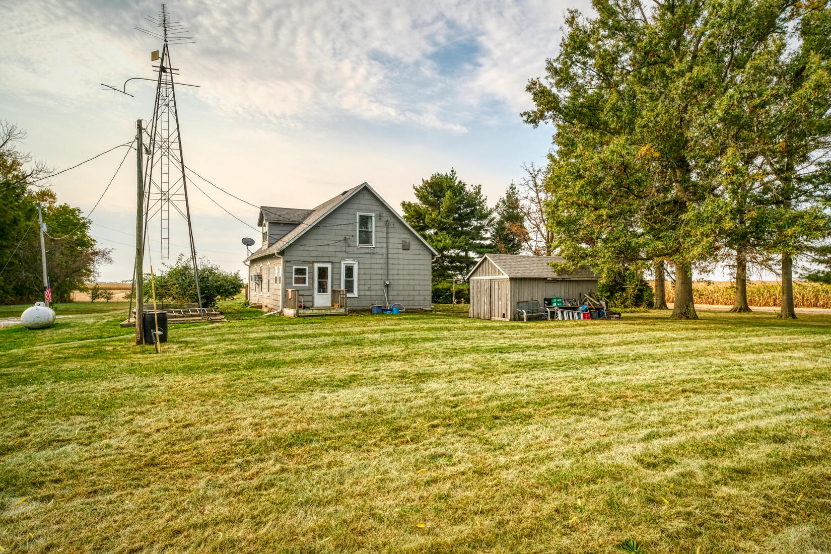 5790 West 700 South Morocco, IN 47963 - Photo 4 of 28 a front view of a house with a yard